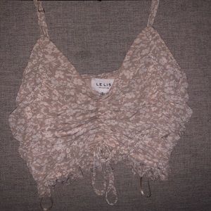 white and tan floral crop top